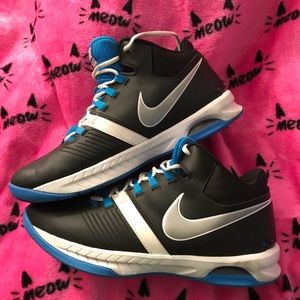 Pair of Nike high top basketball sneakers
